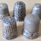 COLLECTION of 5 antique STERLING SILVER SEWING THIMBLES