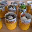 150 Ü-Eier bzw gelbe Ü-Ei Kapseln K 95 - K 99 original Ferrero mit Hartplastik